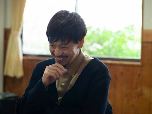 インタビューに答える松田さん