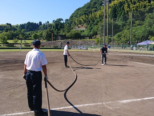 3年連続金沢開催「NPBガールズトーナメント」では大会役員とともにグラウンド整備