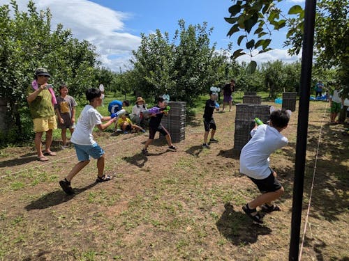 地域団体と協力して、子ども向けの水鉄砲イベントを開催。新たな夏のイベントを創出!