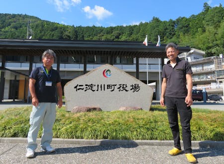 川手功司さん(写真右)