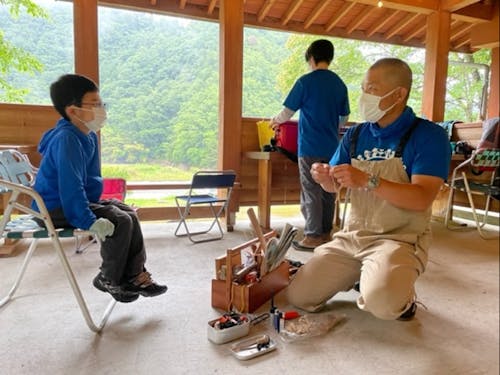 6月の親子キャンプの様子~火おこし体験~