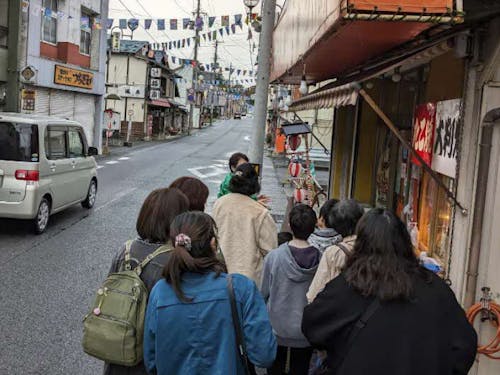 昨年度の交流会では商店街をガイドしていただきました