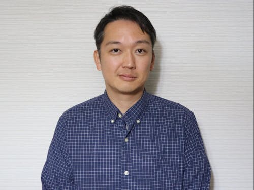 『移住者体験談』講演者の濱名広行さん。