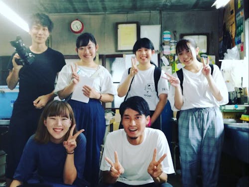 新潟市内のプレイヤーと出会う大学生たち