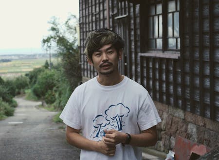 コーディネーターの大見謝(合同会社TENG)。大山町6年目、地域の場づくり・メディアづくりに関わり、元添乗員だった経験を活かして滞在サポートします
