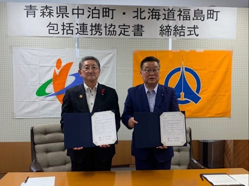 (左)濱館豊光中泊町長 (右)鳴海清春福島町長